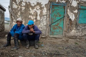 Two men in mongolian mine village